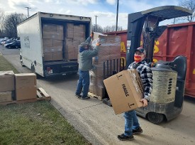 Don & Charlie at CVS warehouse with Mike making a pick-up