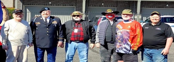 A bunch of old Vietnam Vets helping distribute the Indiana Vietnam Veteran Gift Book.