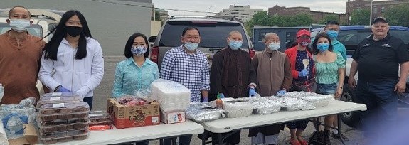 Sarah (from Vietnam) & Carlos (from Mexico) together again serving our homeless friends in Indy.